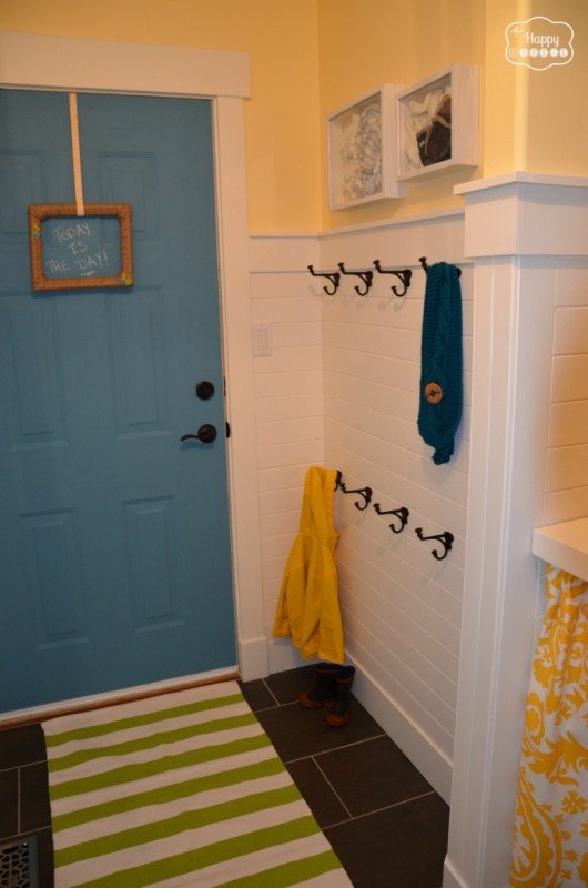 Laundry Room after horizontal white paneling turquoise chalkboard paint door and hooks at thehappyhousie 678x1024 1