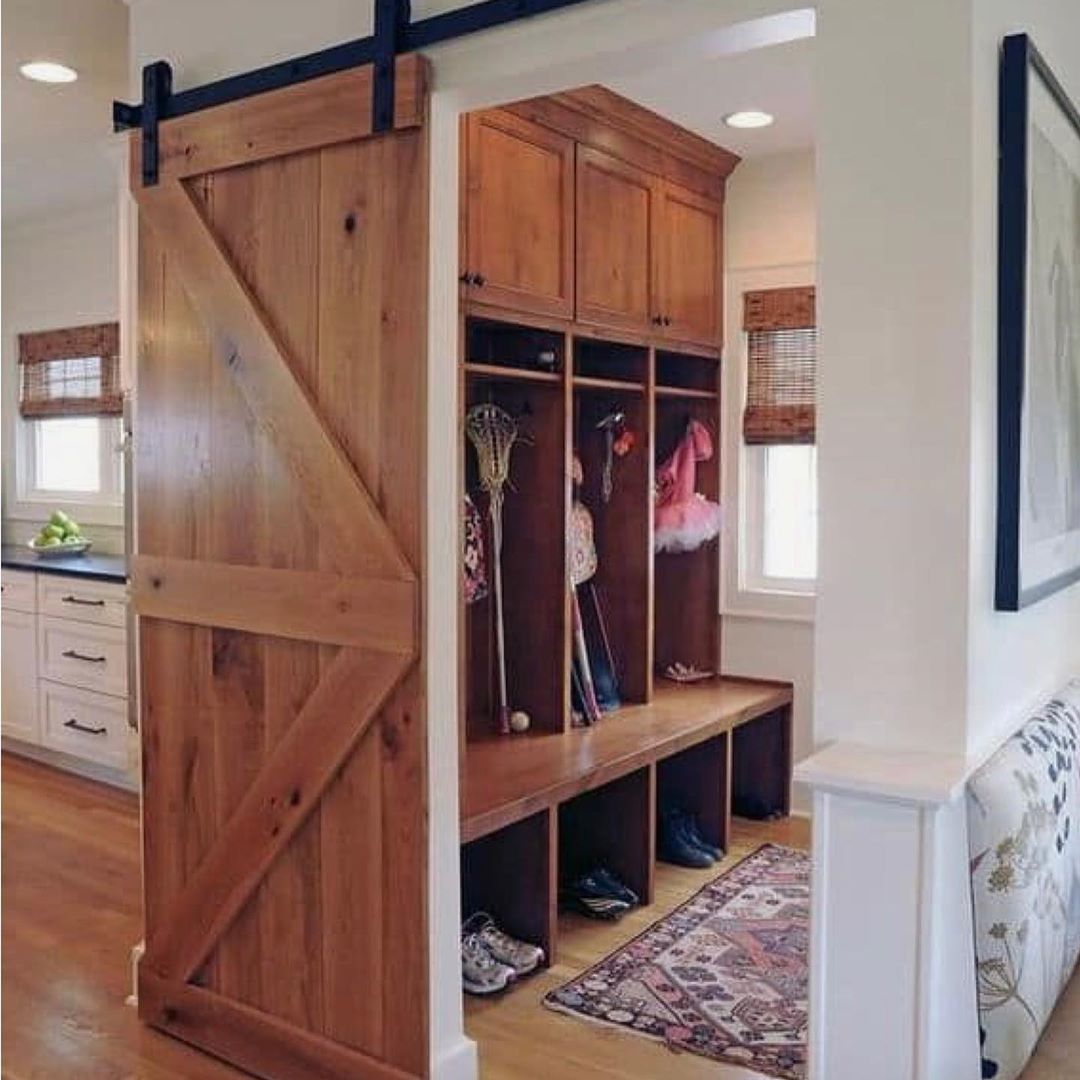 mudroom ideas rustic mudroom with silding barnyard doors CCGnmhEnGvO