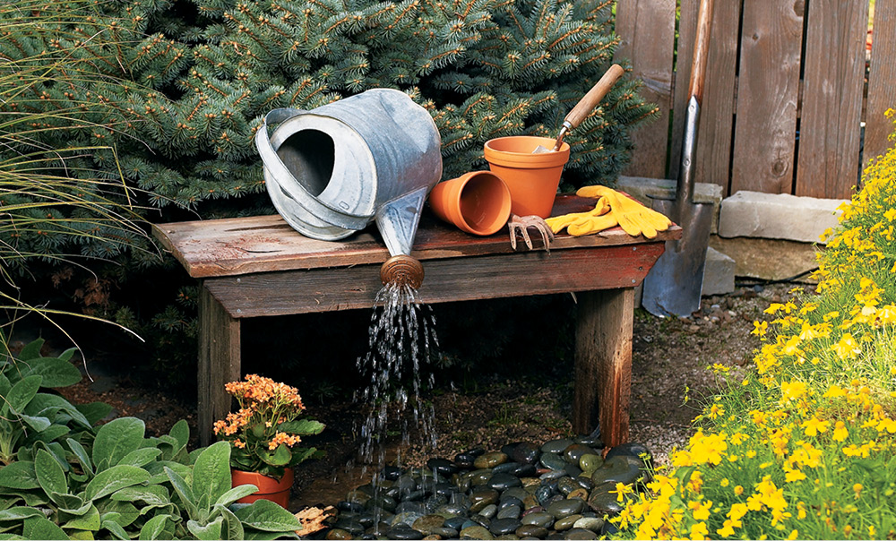 water features tipped watering can water feature myhomemystyle