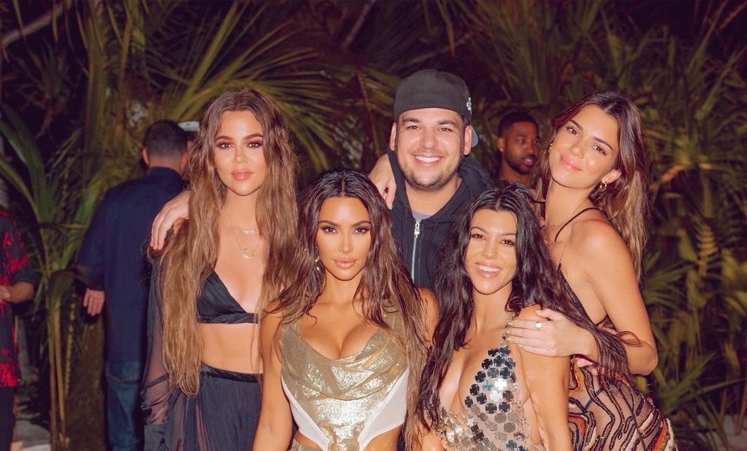 Rob Kardashian with the sisters