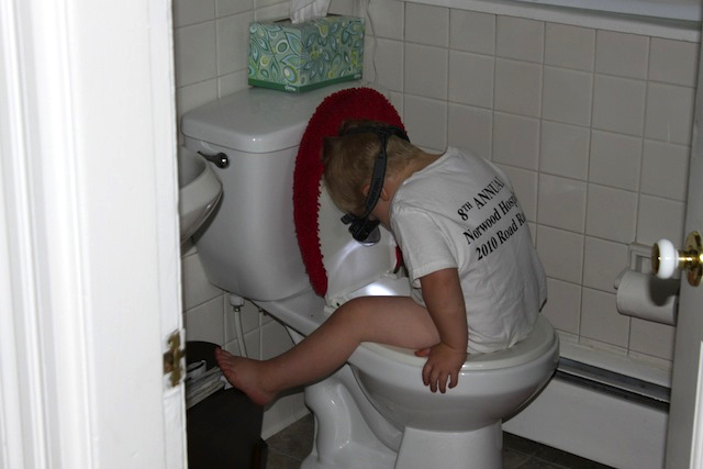 potty training use try sitting on the toilet backward redtri