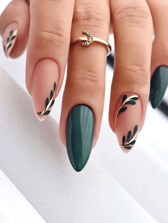 Nude And Dark Green Almond Nails With Gold And Leaf Design