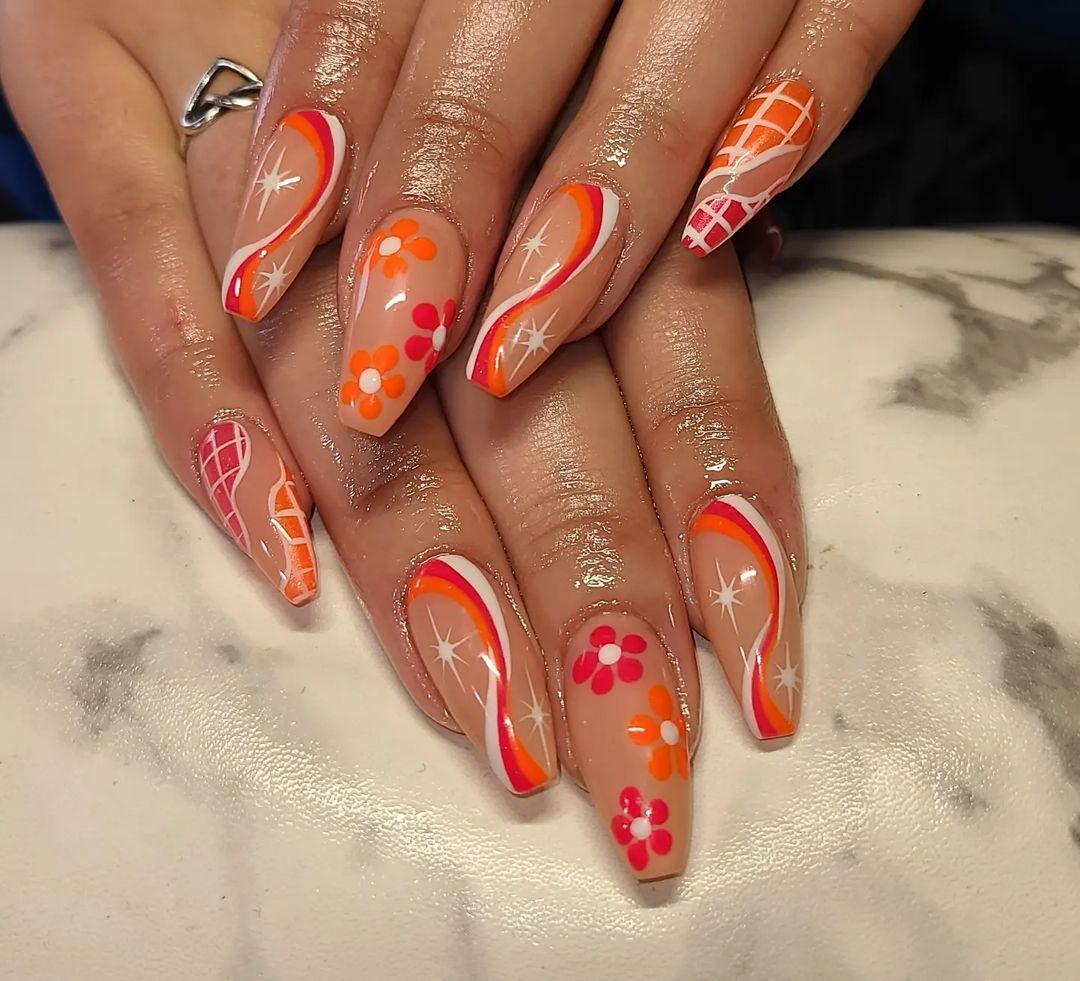 Nude Coffin Nails With White And Orange Lines And Floral Design