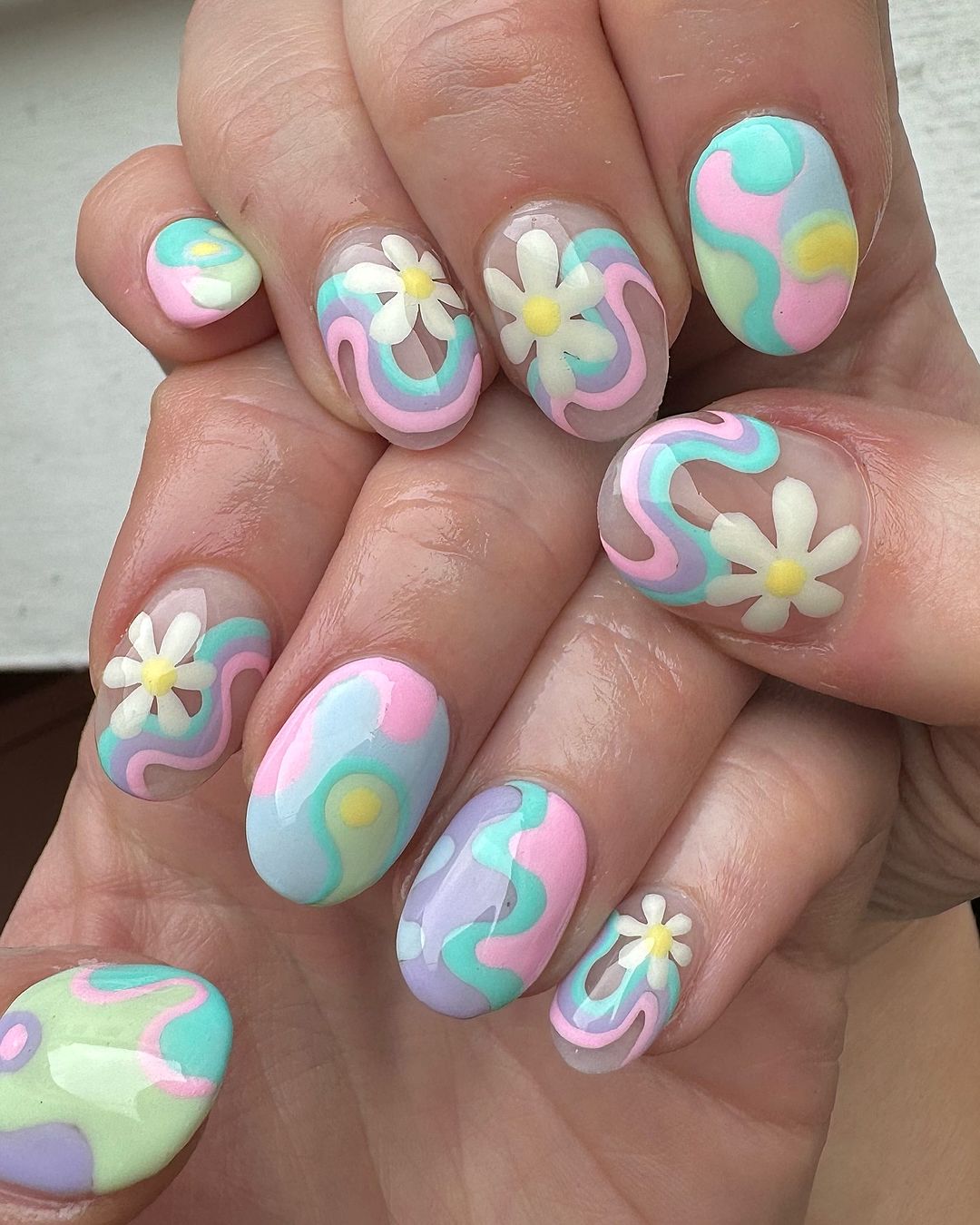 Short Oval Nails With Pastel Rainbow Swirls