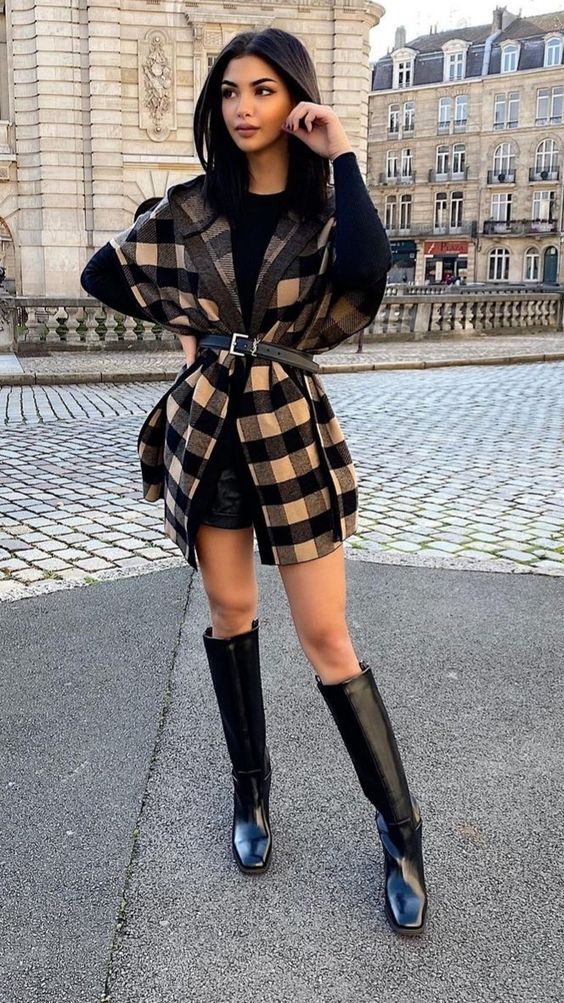 Black Shorts and blouse with Large Scarf Tied With a Belt and Knee High Boots