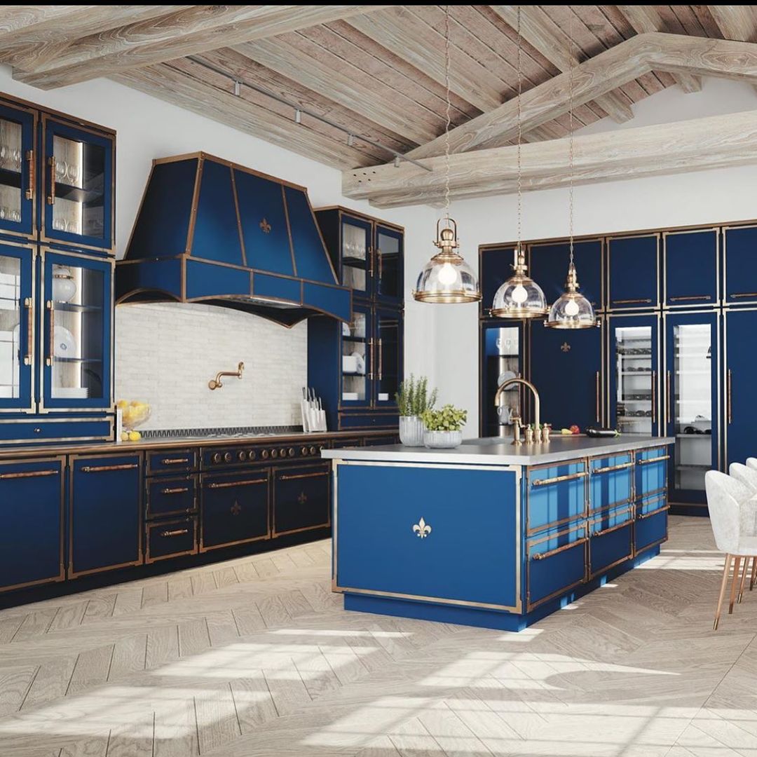 Blue And Gold Cabomets, Hangin Chandeliers And Kitchen Island With Light Gray Countertops