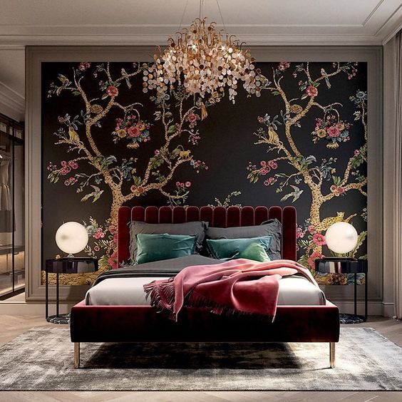 Crimson Bed With Headboard and Blackk Mural Wallpaper With Blossoming Trree Motif