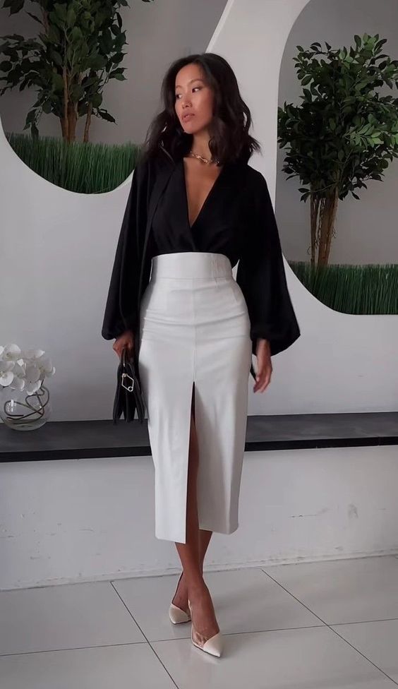 Low Blunge Wide Sleeved Blouse And High waisted Anckle Skirt With Front Slit