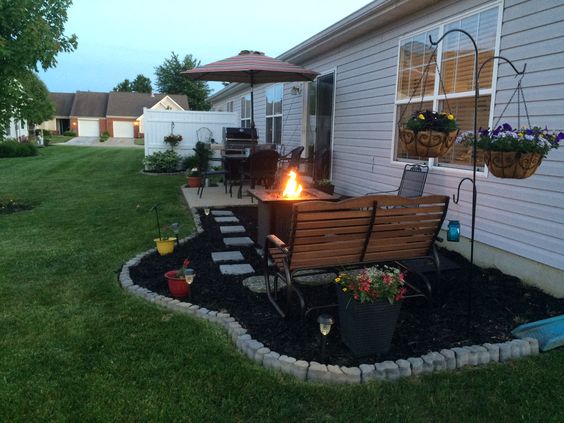 Patio Extension With mulch, Paver Steps, and Concrete Edgers