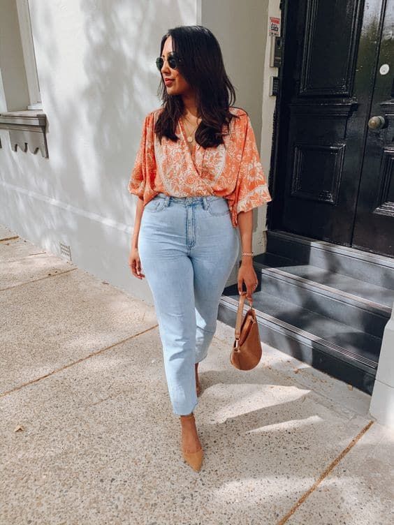 Peach Floral Elbow Lenght Blouse With Form Fitting Jeans