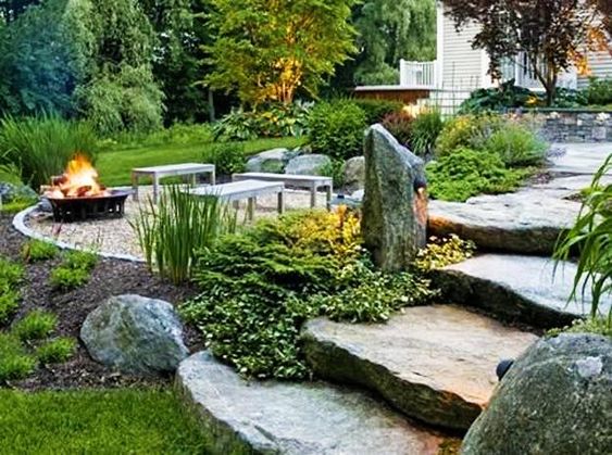 Rock Decorated Garden With SLab Steps, Patio And bolder Pieces