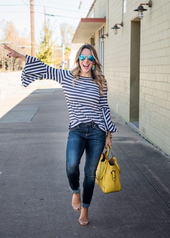 Striped Black And White Bell Sleeved Blouse, Jeans And Yellow Bag