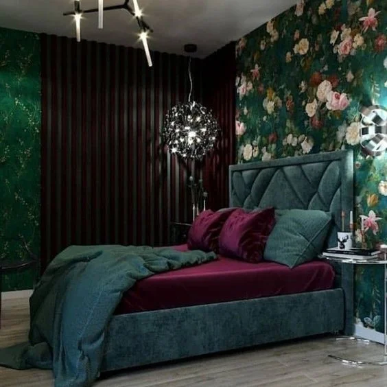 Teal And Mulberry BEdroom With Floral Walpaper And Wood Paneling