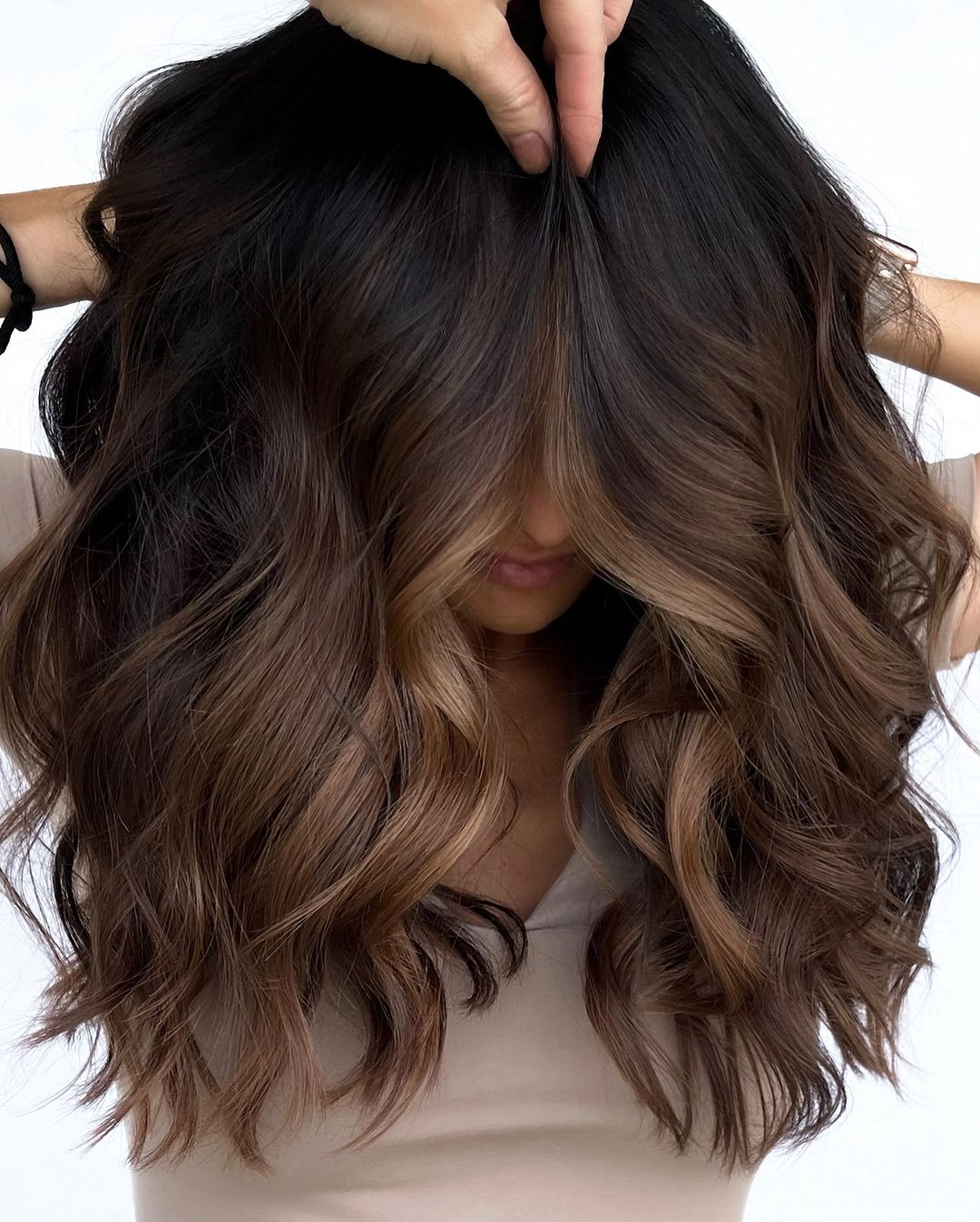 Wavy Chocolate Brown Hair With Light Caramel Highlights At The Front