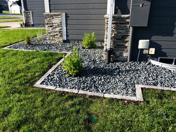 Black Gravel With Border Edging Along The House