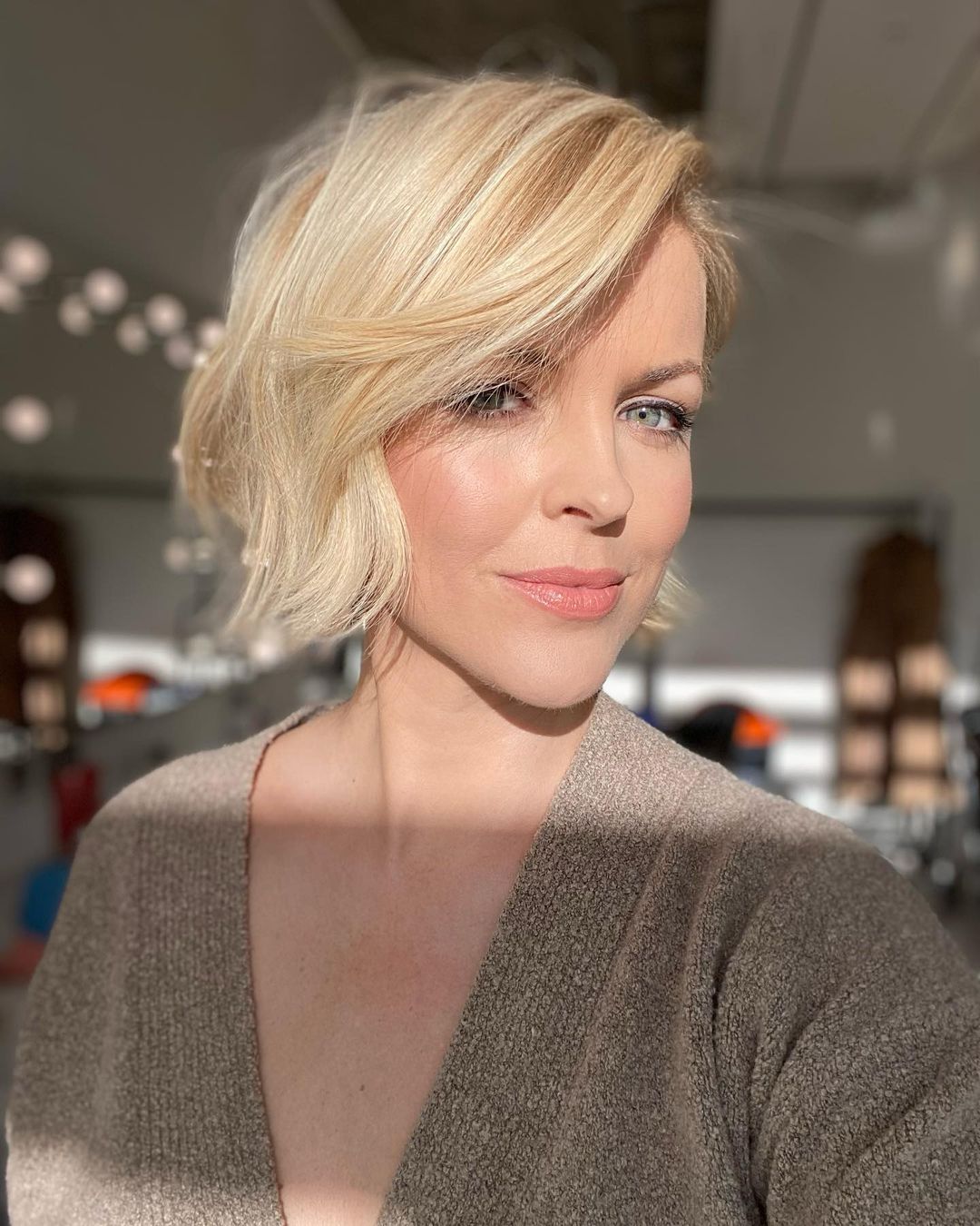 Blonde Asymmetrical Razor Cut Bob