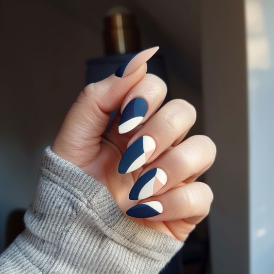 Blue And White Geometric Design On Almond Nails