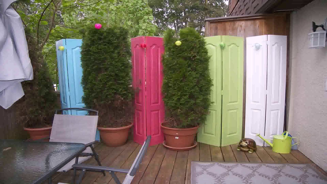 Colorful Outdoor Privacy Screen And Trees In Pots