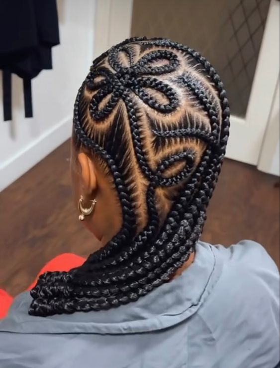 Medium Straight Cornrows Parted By Wavy Micro Vornrows