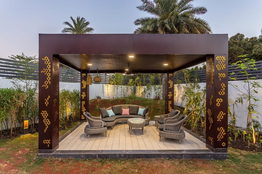 Gazebo With Back Lit Metal Cut Work And Wooden Ceiling