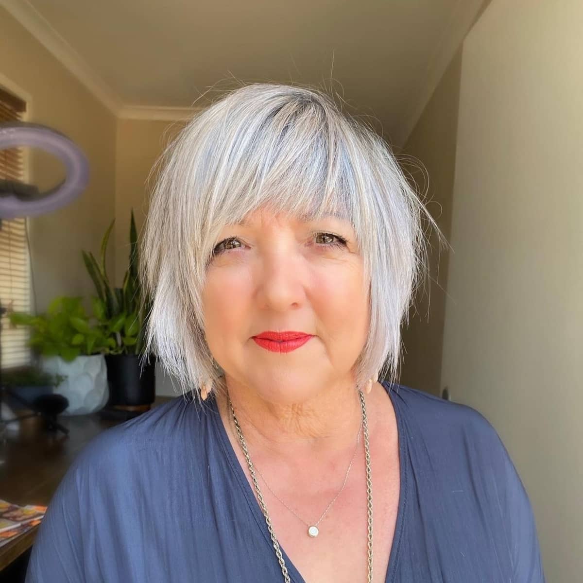 Gray And Blue Highlights Choppy Bob With Bangs For Round Face