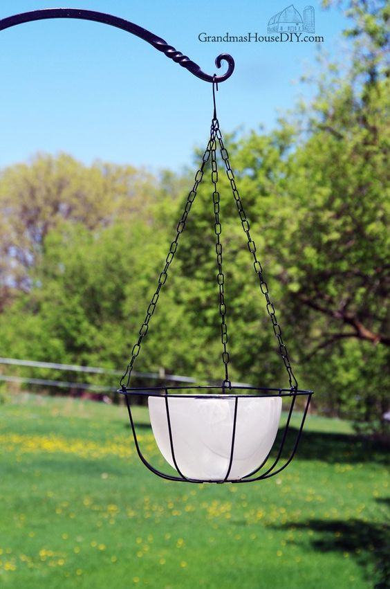 Hanging Solar Light With Glas Bowls And Wire Planter