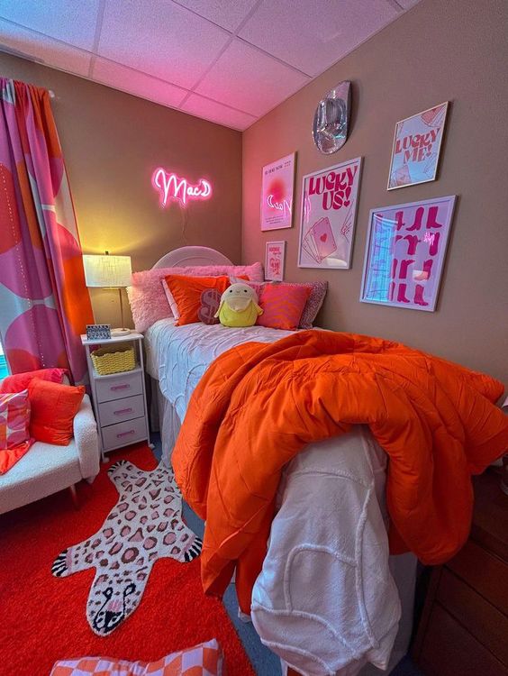 Orange Covers And Carpet With Pink Wall Art And Curtains