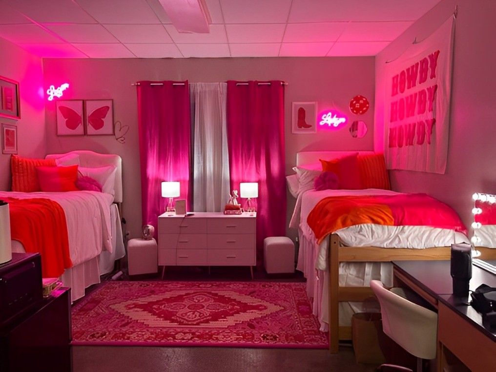 Pink Dormroom With Orange Accessories