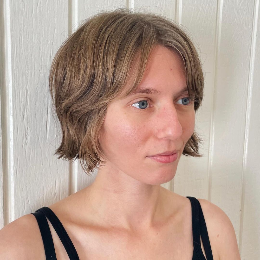 Short Razor Carved Textured Bob With Curtain Bangs On Thin Hair