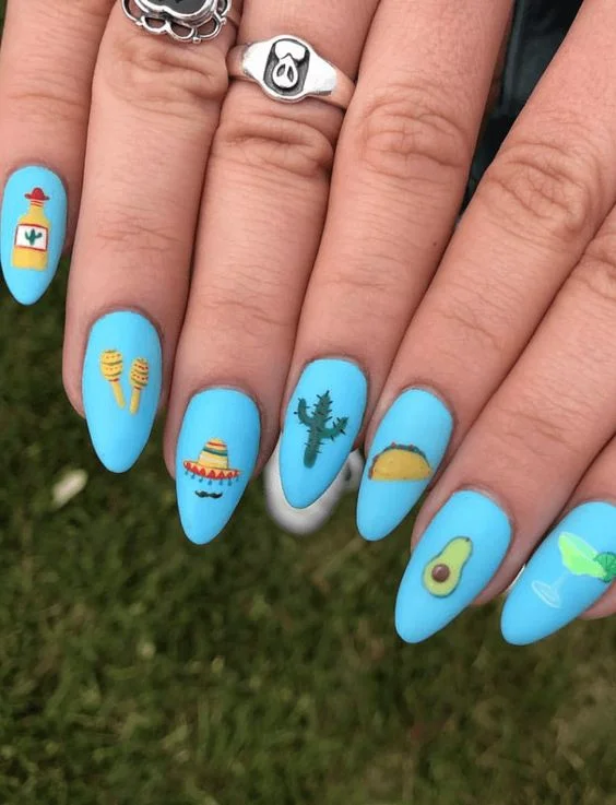 Sky Blue Almond Nails With Mexican Symbols