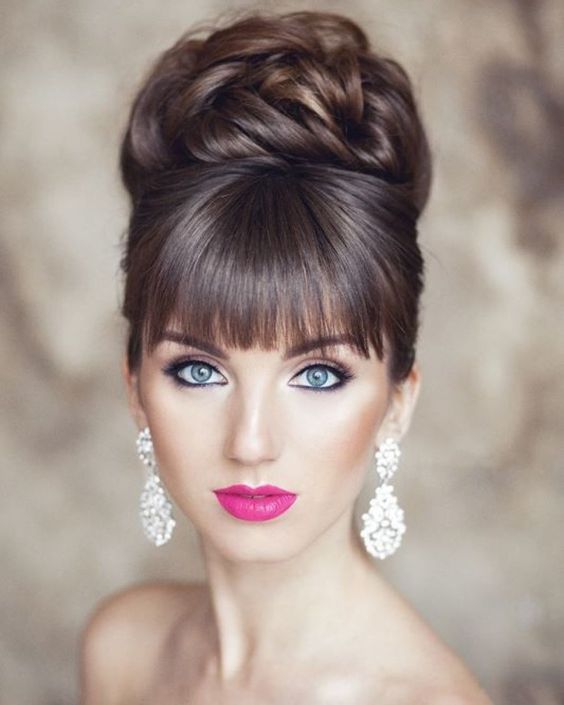 Slick Loose Braided Bun With Fringes