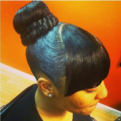 Slicked Back Donut Bun Praped With Braid And High Slick Bangs