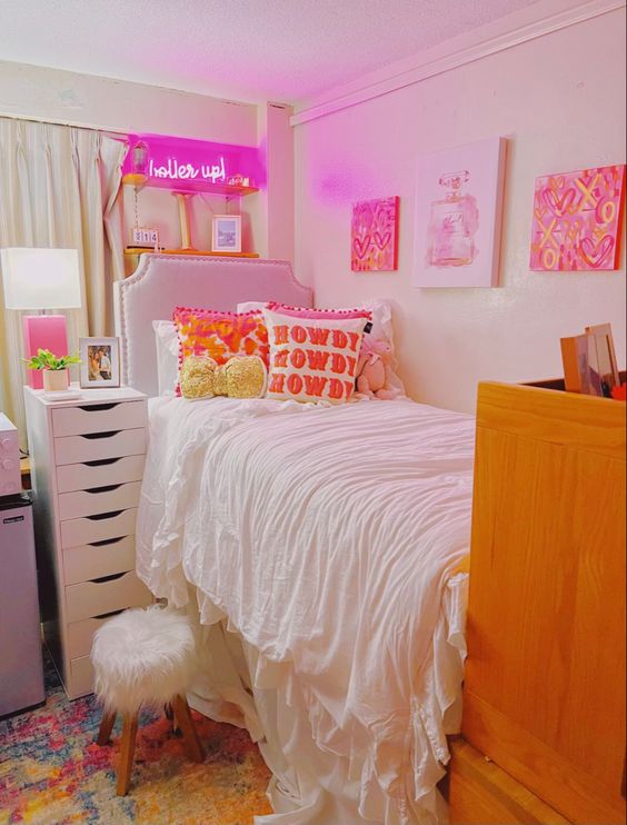 Soft Pink Headboard, Orange Pillows and Orange Pink Wall Art