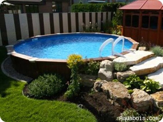 Above-Ground Pool Witg Natural Stone Elements And Landscaping