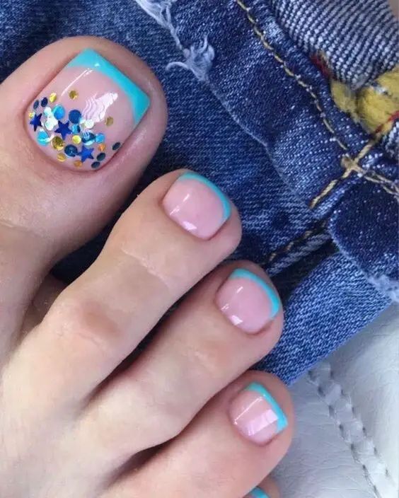 Clear Toes With Blue French Mani And Conffetti