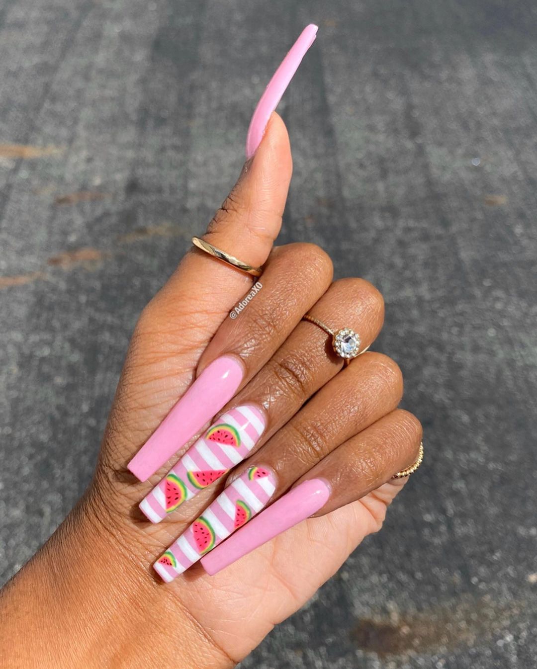 Long Coffing Pink Striped Nails With Watermelon Slices Design