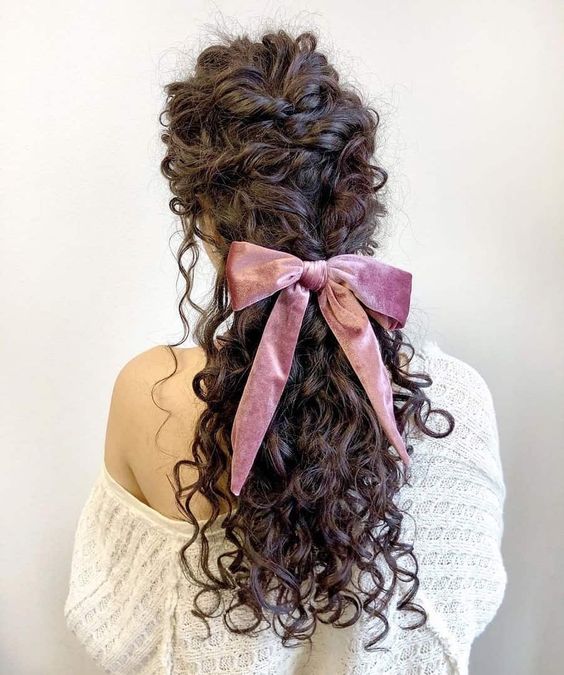 Loose French Braid Into Low Ponytail