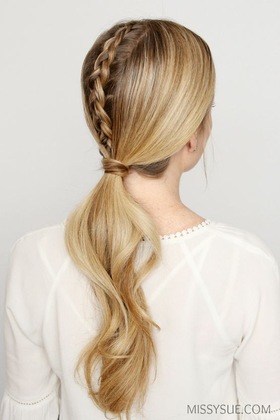 Upside Down French Braid On Bakc Of Hair And Loose Ponytail