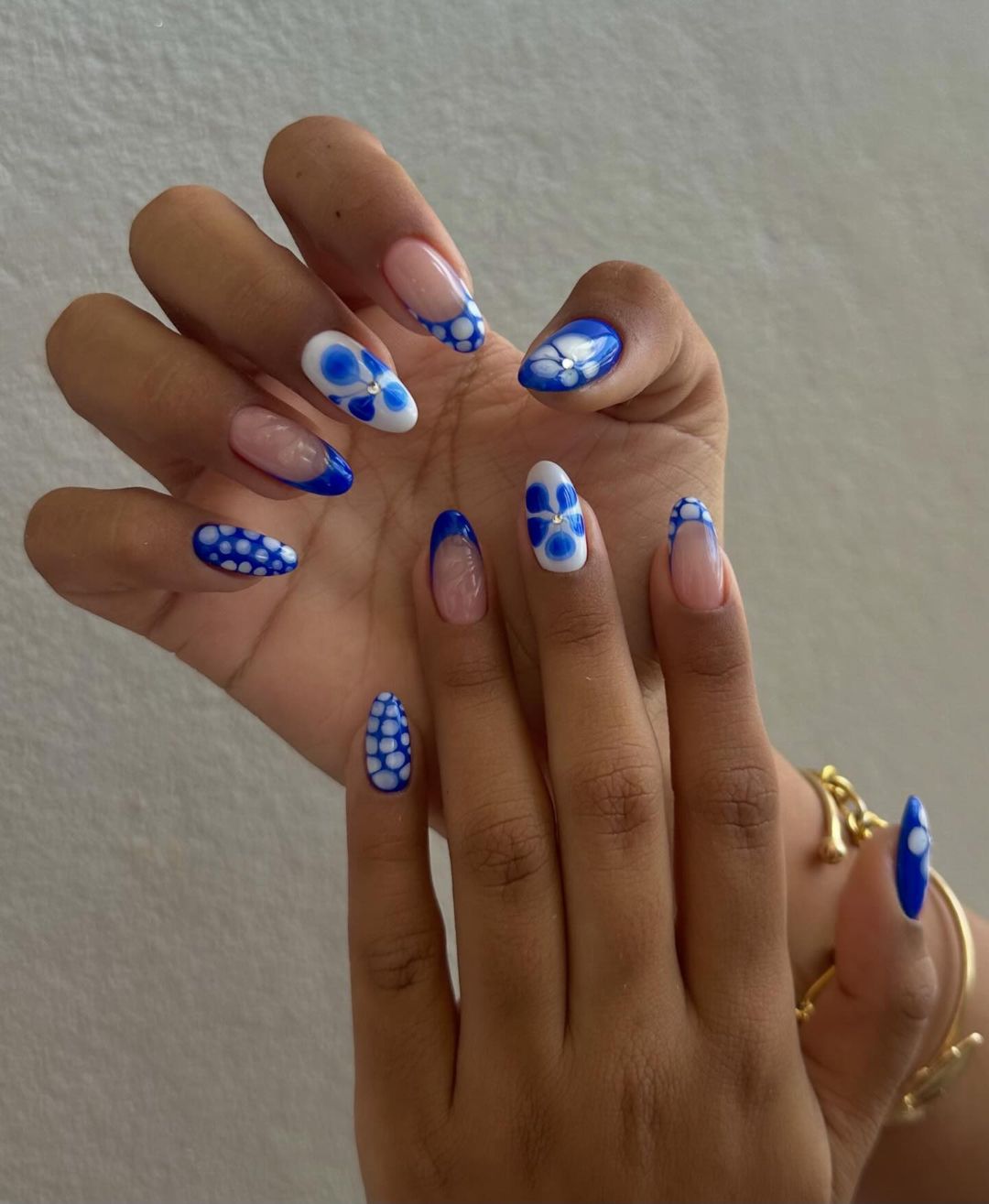 White And Blue Dotted Floral Nails With Blue French Mani