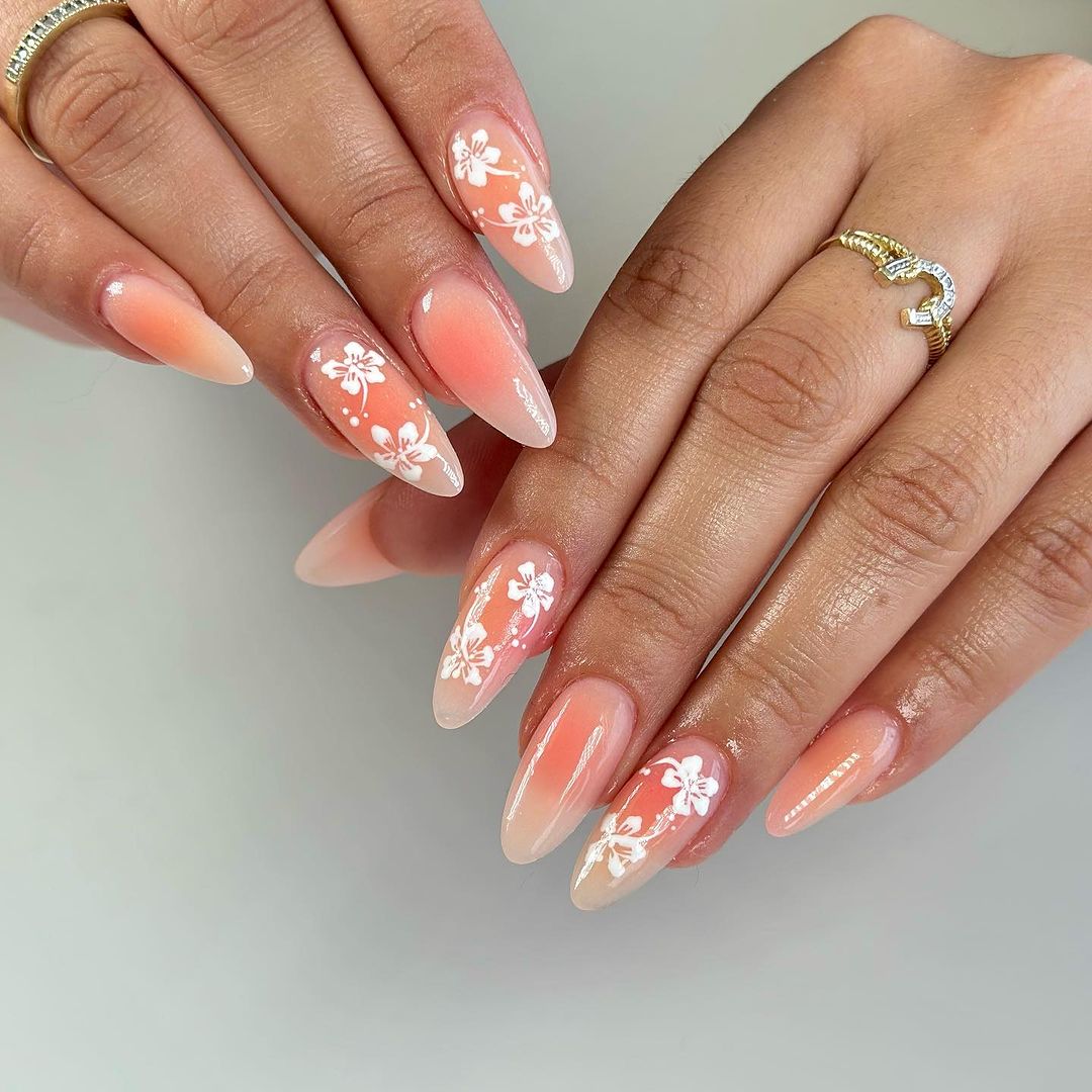 Acrylic Oval Peach Nails With White Hibiscus