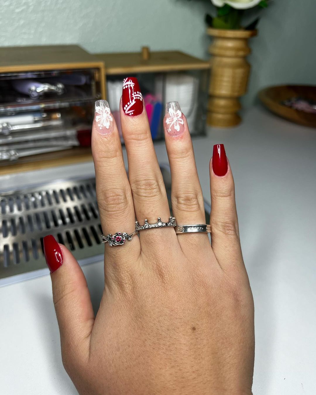 Clear And Red Short Nails With White Hibiscus Design