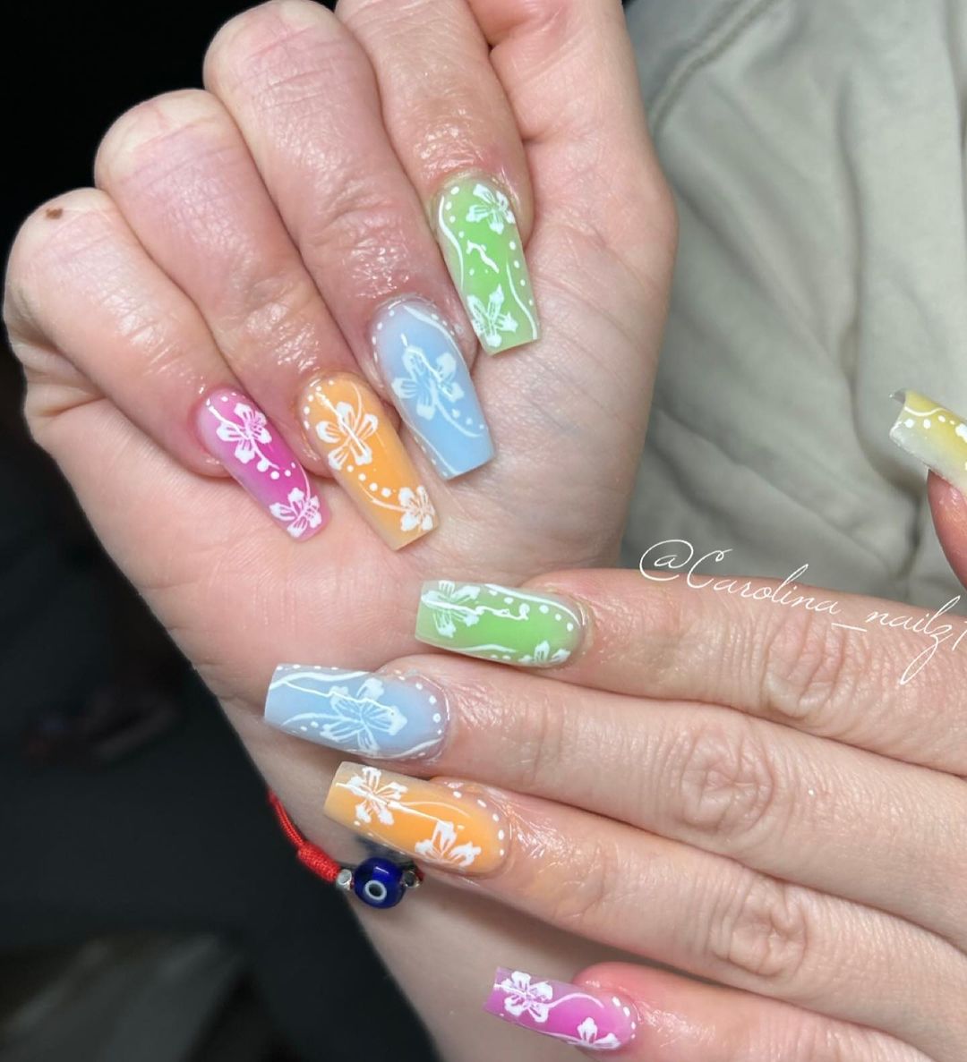 Colorful Pastel Nails With White Hibiscus Design