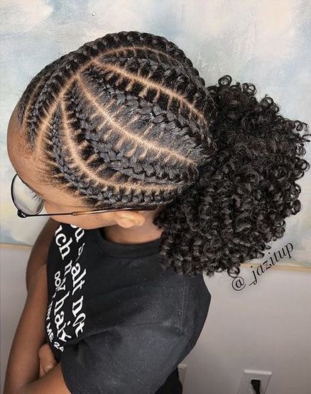 Curved Chunky Cornrows With Loose Coily Ponytail Puff