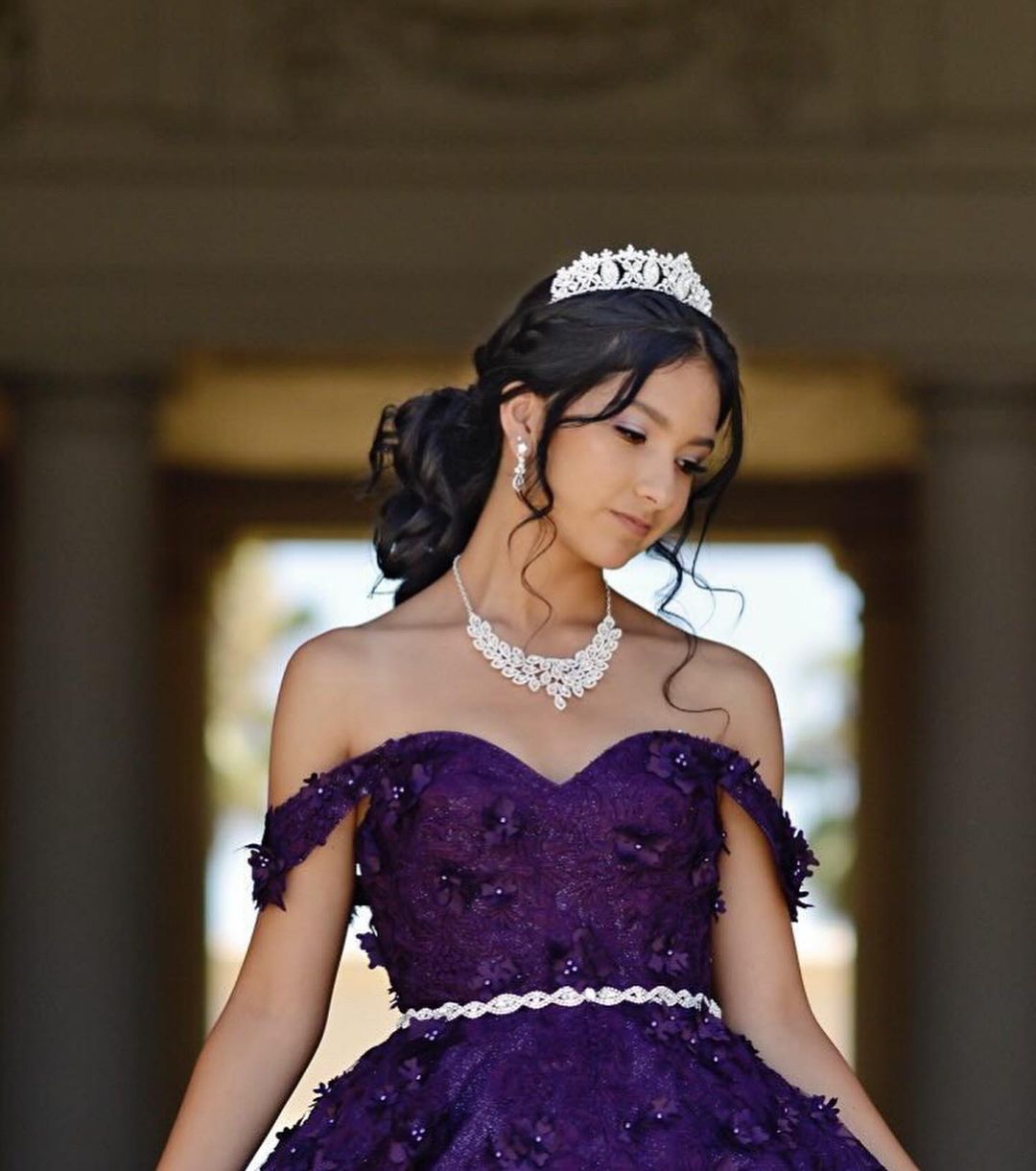 Elegant Messy Bun With Tiara And Loose Wisps