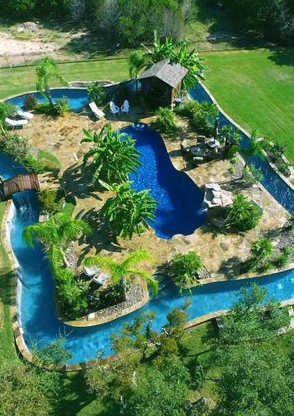 Lazy River Pool With Tropical Landscape, Island and Inner Pool