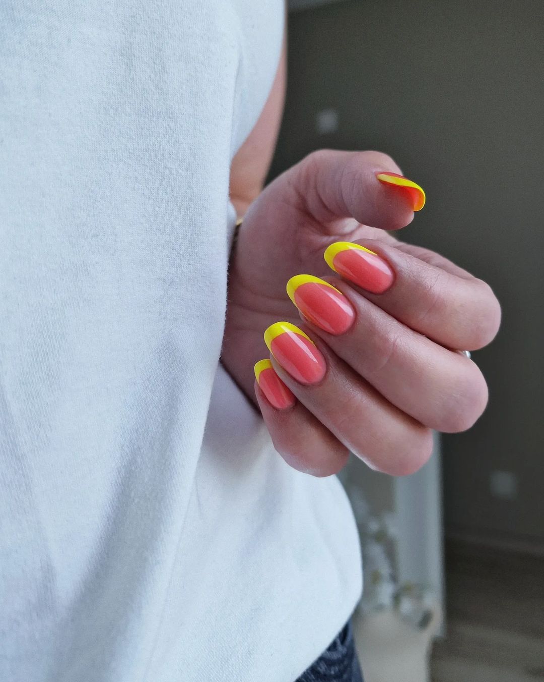 Oval Grapefruit Pink Nail With Yellow French Mani