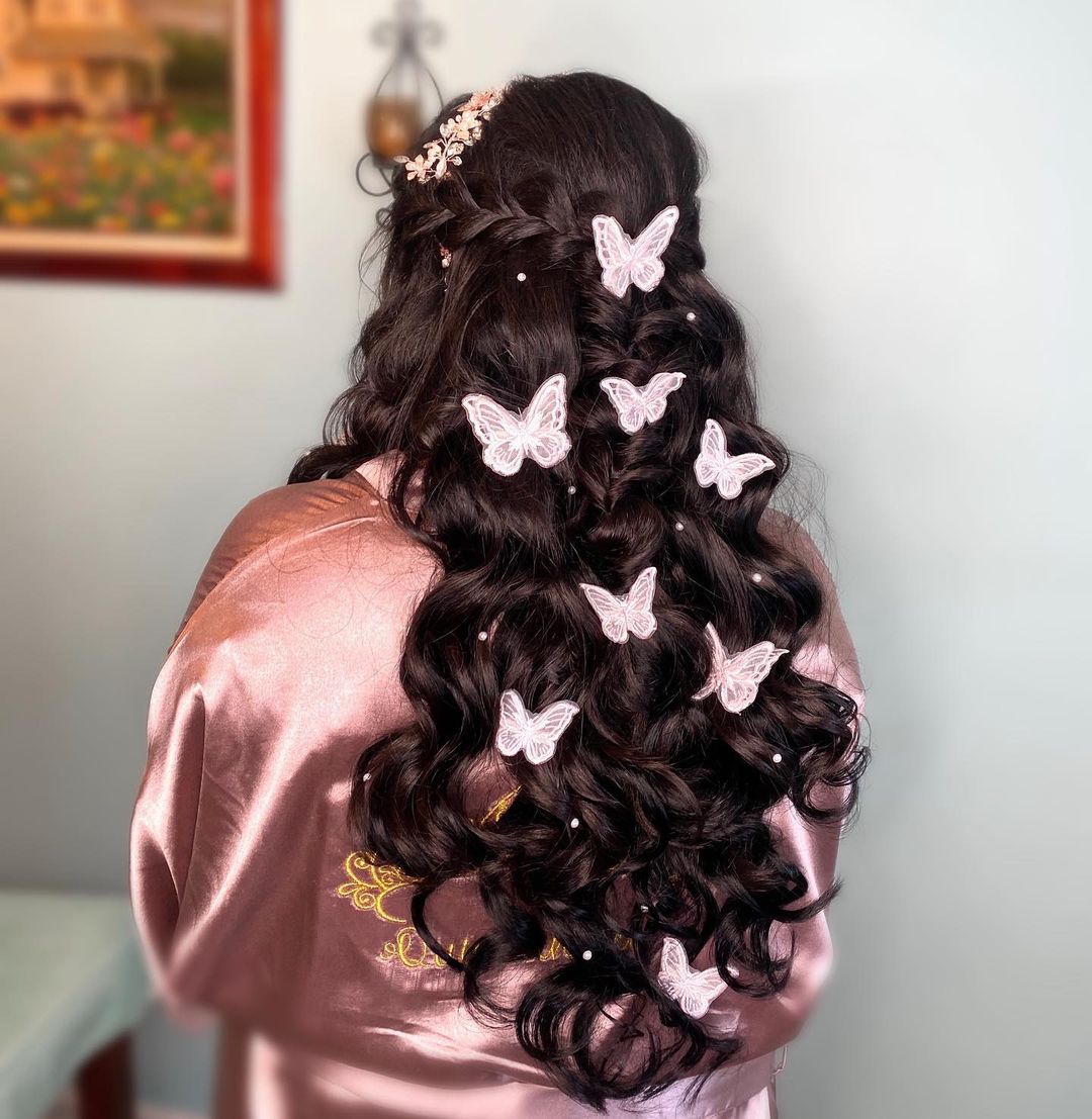 Pulled Back French BRados With Wavy Loose Hair With Butterflied And Pearls