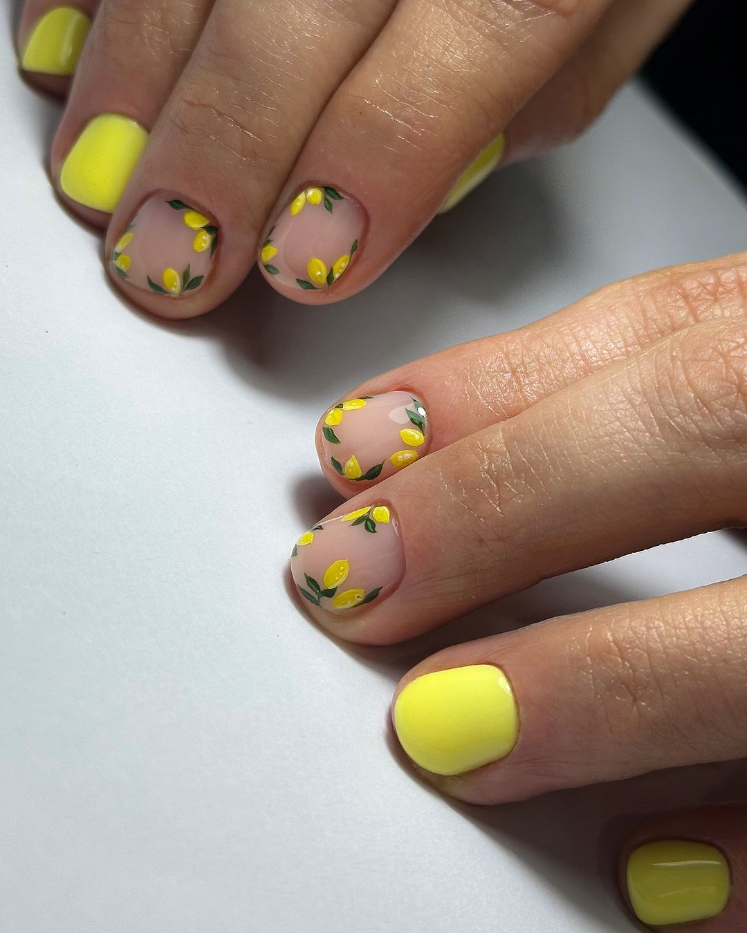 Short Yellow Nails With Lemon Design Edges