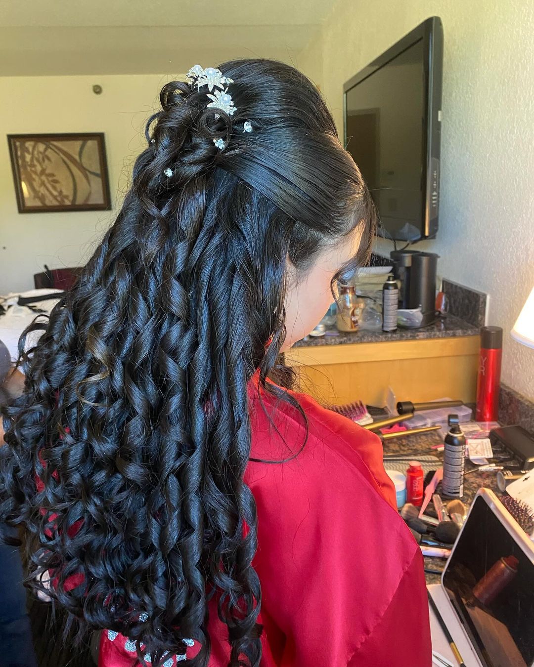 Slick Puff With Half-up Bin And Long Curls