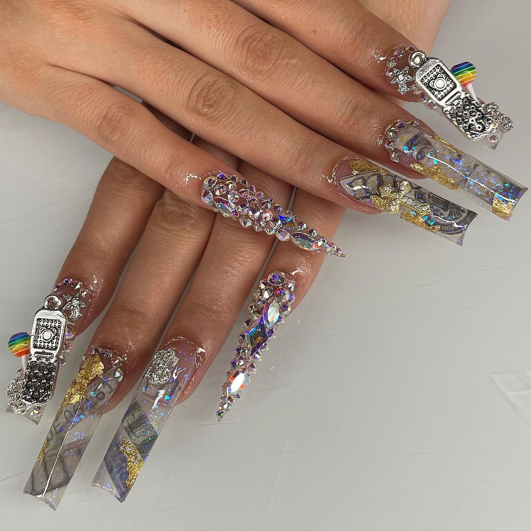 Long Clear Strip And Rhinestone Covered Nails